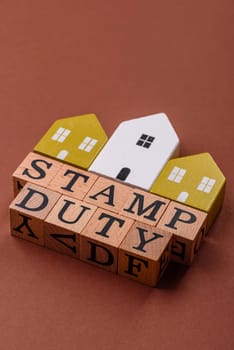 Stamp duty tax, property investment concept, business processes related to real estate. Stamp duty inscription as a background for business design