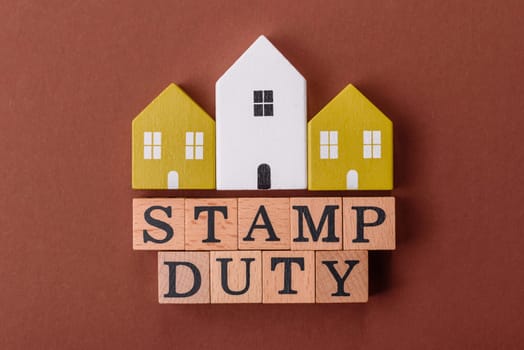 Stamp duty tax, property investment concept, business processes related to real estate. Stamp duty inscription as a background for business design