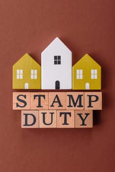 Stamp duty tax, property investment concept, business processes related to real estate. Stamp duty inscription as a background for business design