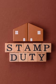 Stamp duty tax, property investment concept, business processes related to real estate. Stamp duty inscription as a background for business design