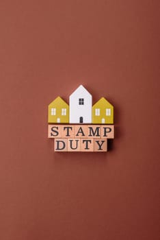 Stamp duty tax, property investment concept, business processes related to real estate. Stamp duty inscription as a background for business design