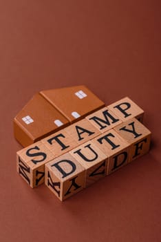 Stamp duty tax, property investment concept, business processes related to real estate. Stamp duty inscription as a background for business design