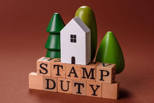 Stamp duty tax, property investment concept, business processes related to real estate. Stamp duty inscription as a background for business design