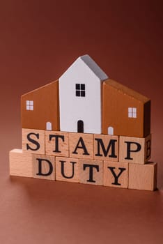 Stamp duty tax, property investment concept, business processes related to real estate. Stamp duty inscription as a background for business design