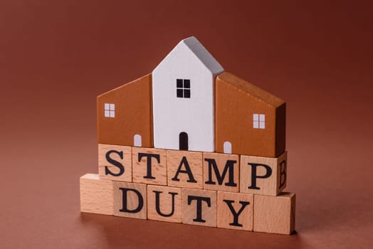 Stamp duty tax, property investment concept, business processes related to real estate. Stamp duty inscription as a background for business design