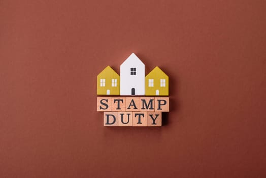 Stamp duty tax, property investment concept, business processes related to real estate. Stamp duty inscription as a background for business design