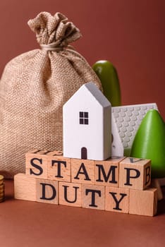 Stamp duty tax, property investment concept, business processes related to real estate. Stamp duty inscription as a background for business design