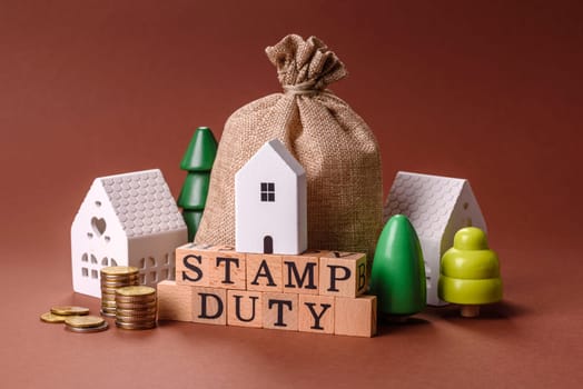 Stamp duty tax, property investment concept, business processes related to real estate. Stamp duty inscription as a background for business design