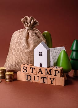 Stamp duty tax, property investment concept, business processes related to real estate. Stamp duty inscription as a background for business design