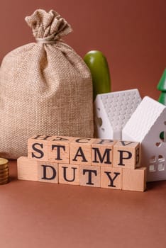 Stamp duty tax, property investment concept, business processes related to real estate. Stamp duty inscription as a background for business design