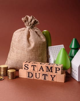 Stamp duty tax, property investment concept, business processes related to real estate. Stamp duty inscription as a background for business design