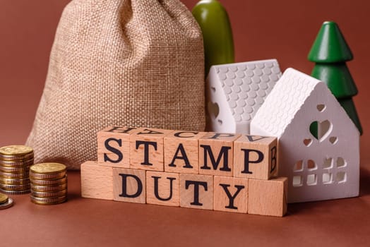 Stamp duty tax, property investment concept, business processes related to real estate. Stamp duty inscription as a background for business design