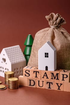 Stamp duty tax, property investment concept, business processes related to real estate. Stamp duty inscription as a background for business design