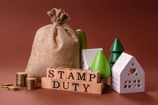 Stamp duty tax, property investment concept, business processes related to real estate. Stamp duty inscription as a background for business design