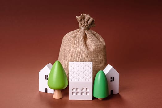 Money, property and loan, conceptual business background. Investments in property or land