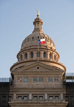 Detail of the dome of the Texas State Capitol building in Austin with renovation underway with scaffolding
