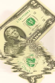Creative conceptual image of US dollar bills partially submerged in water with a water reflection effect. Symbolizes financial crisis, liquidity problems, or a fluctuating economy. Ideal for articles or graphics related to money, finance, economics, or global markets.
