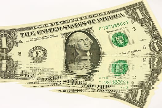 Creative conceptual image of US dollar bills partially submerged in water with a water reflection effect. Symbolizes financial crisis, liquidity problems, or a fluctuating economy. Ideal for articles or graphics related to money, finance, economics, or global markets.