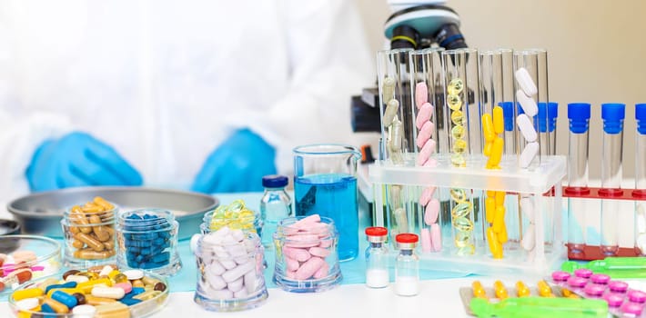 examine drugs in the laboratory. Selective focus. pills.