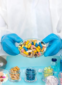 examine drugs in the laboratory. Selective focus. pills.