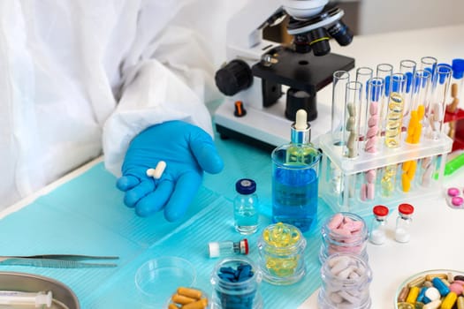 examine drugs in the laboratory. Selective focus. pills.