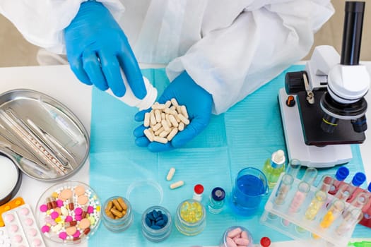examine drugs in the laboratory. Selective focus. pills.