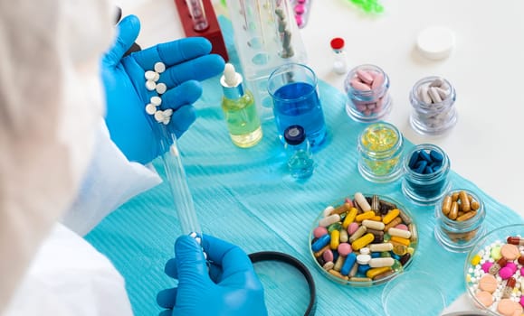 examine drugs in the laboratory. Selective focus. pills.