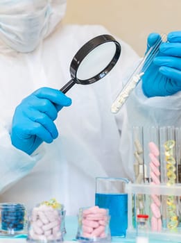 examine drugs in the laboratory. Selective focus. pills.