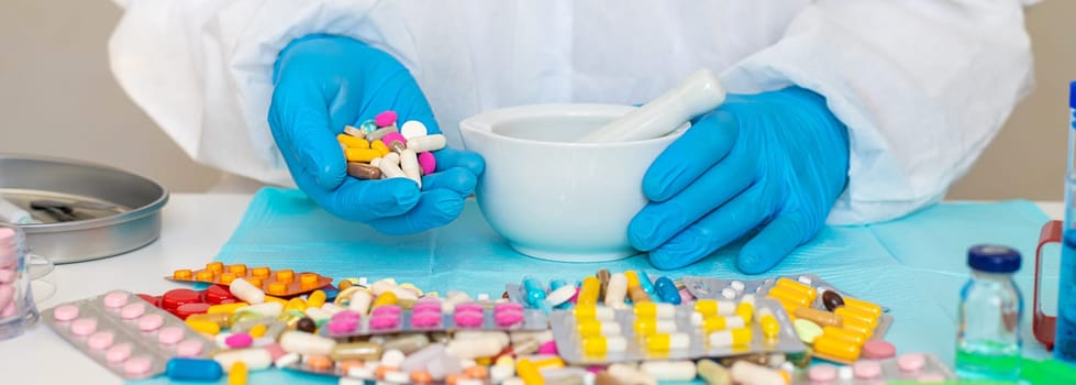 examine drugs in the laboratory. Selective focus. pills.