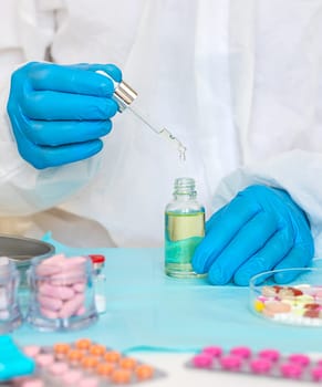 examine drugs in the laboratory. Selective focus. pills.