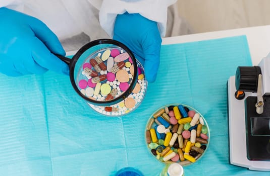 examine drugs in the laboratory. Selective focus. pills.