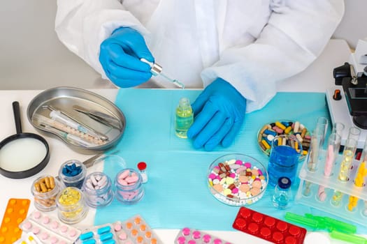 examine drugs in the laboratory. Selective focus. pills.