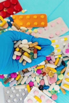 medicines in the hands of a doctor. Selective focus. pills.