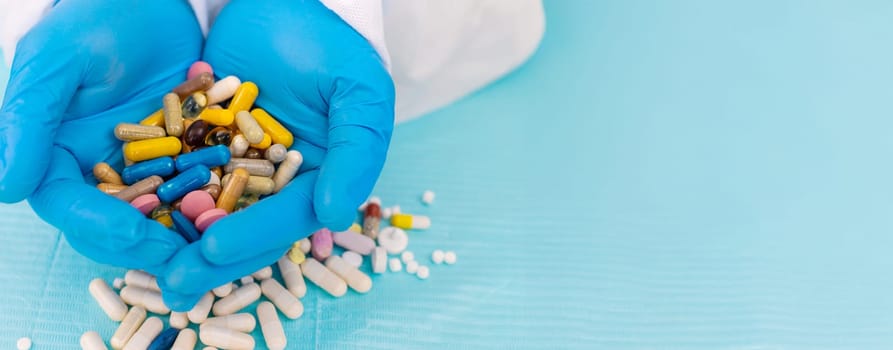 medicines in the hands of a doctor. Selective focus. pills.