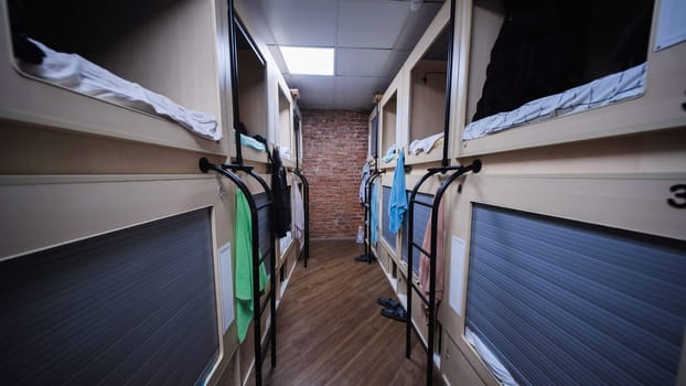 Capsule hotel rooms offering comfortable and private sleeping spaces for travelers seeking budget-friendly accommodation