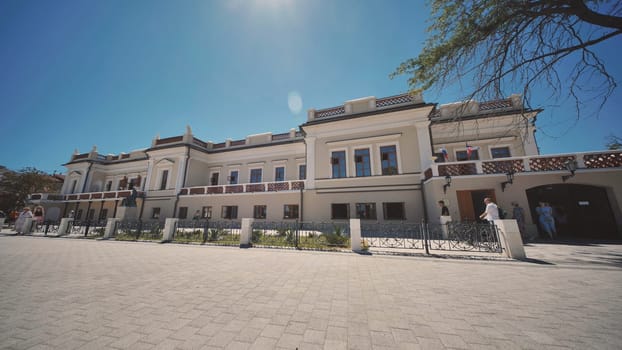 Tourists visiting the elegant Chekhov Museum in Yalta, Crimea, celebrating the renowned playwright's life and works
