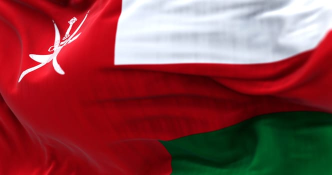 3D render of the national flag of Oman fluttering in the wind, with khanjar symbol representing Omani pride, tradition, and unity under the sultanate.