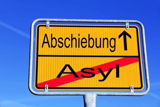 German street sign with the inscription Asylum and deportation