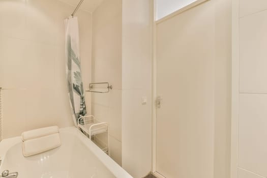 a bathroom with a bathtub and toilet in the corner, next to a shower stall on the right side