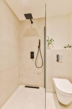 a modern bathroom with white walls and beige flooring, including a walk - in shower stall attached to the wall