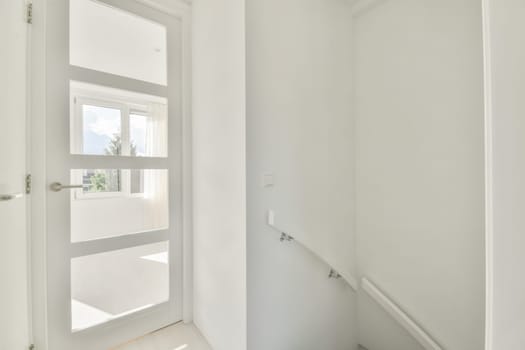 the inside of a house with white walls and wood flooring in an empty room that has been used for several years