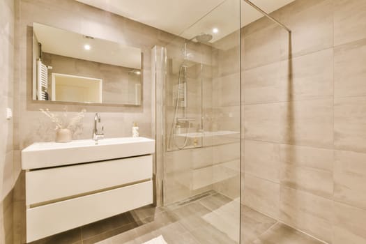 a bathroom that is very clean and ready to use as a shower stall or room divider for the toilet