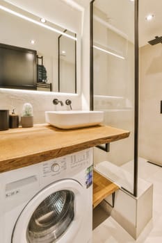 a laundry room with a washer and dryer in the corner, while it's not too clean