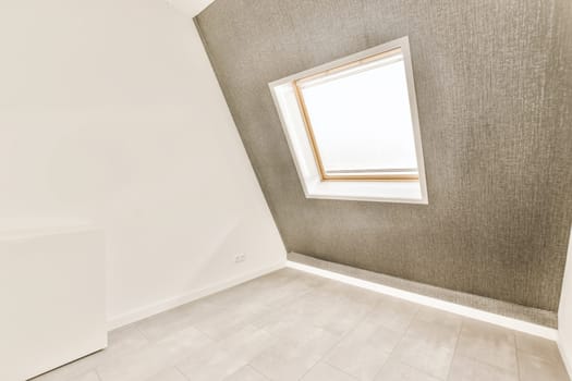 an empty room with tile flooring and white walls in the wall is not visible, but there is no image