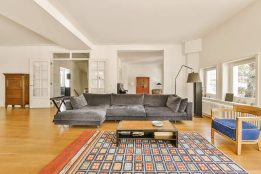 a living room with couches and rugs on the floor in front of the sofa is an area for furniture to be used