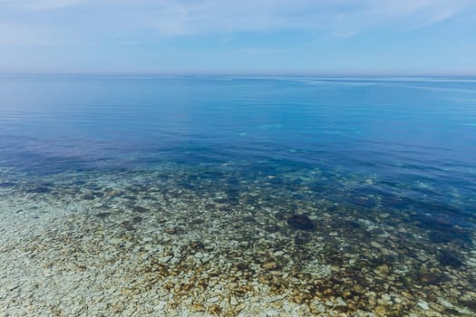 Beautiful seascape with sandy beach and blue sky