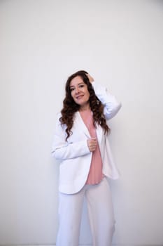 brunette woman smiling on white office background