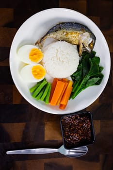 Steamed Rice With Fried Mackerel Chili Paste, Background for advertising and wallpaper in food and culture scene.