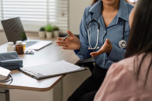 The nurse provides valuable insights into health issues, demonstrating care and professionalism during the patient consultation.