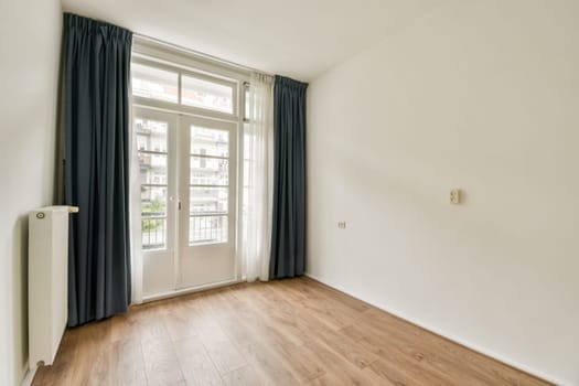 Bright and airy minimalist interior showcasing a spacious room with large windows, wooden floor, and elegant curtains emphasizing simplicity.
